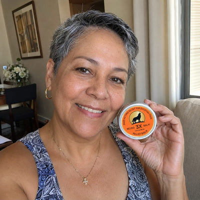 Happy customer holding the product